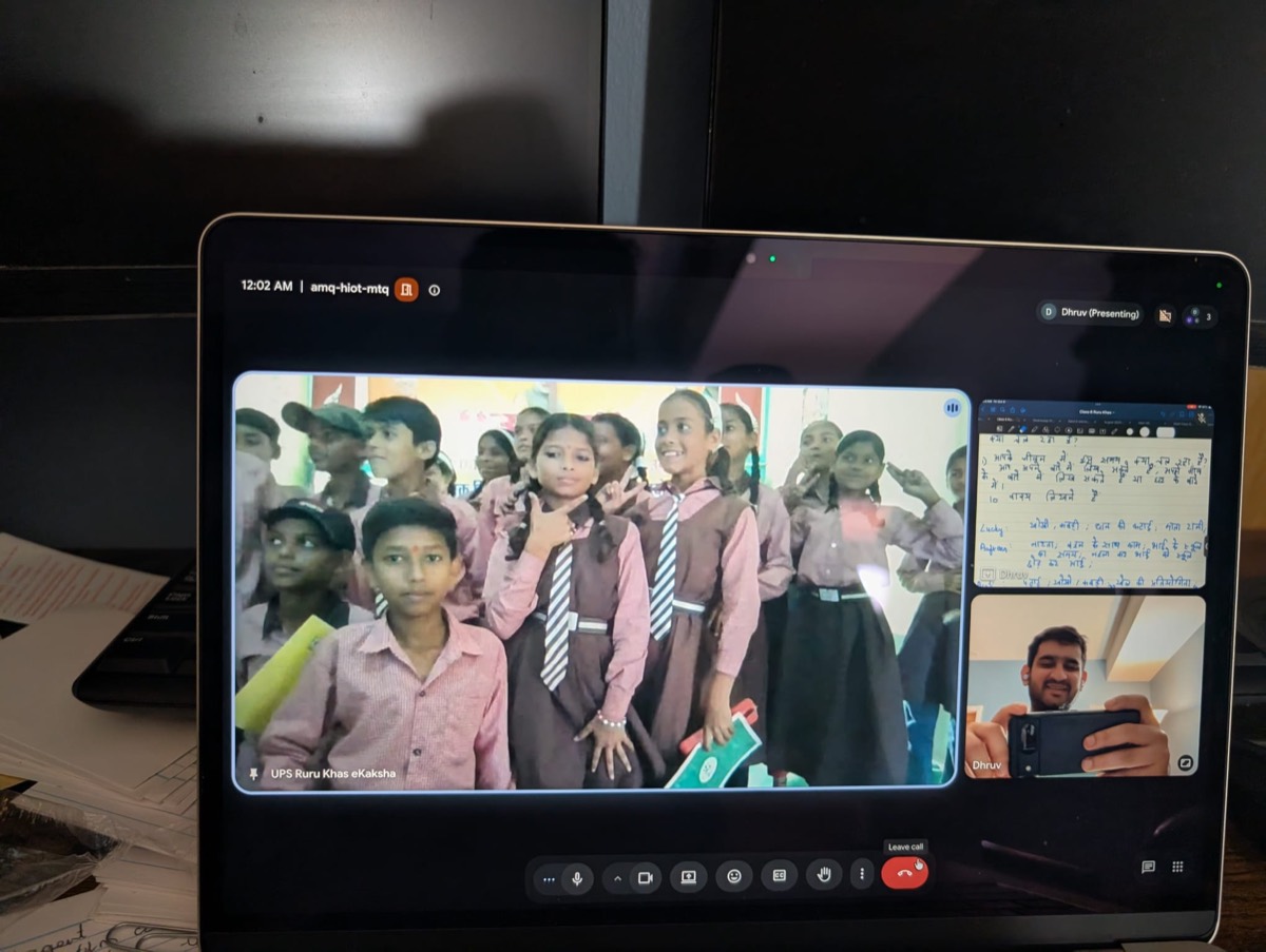 Students crowding in front of the camera and posing during a virtual session